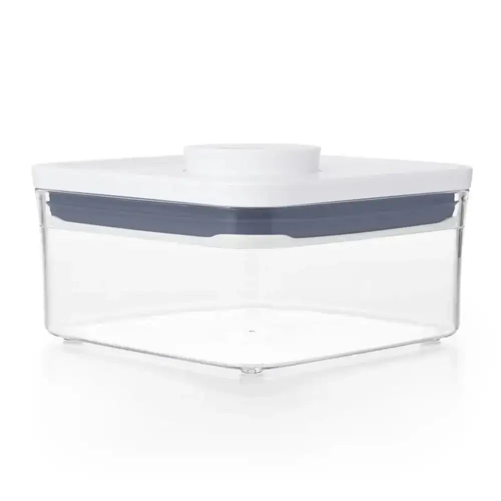 Clear storage container with a white lid on a white background