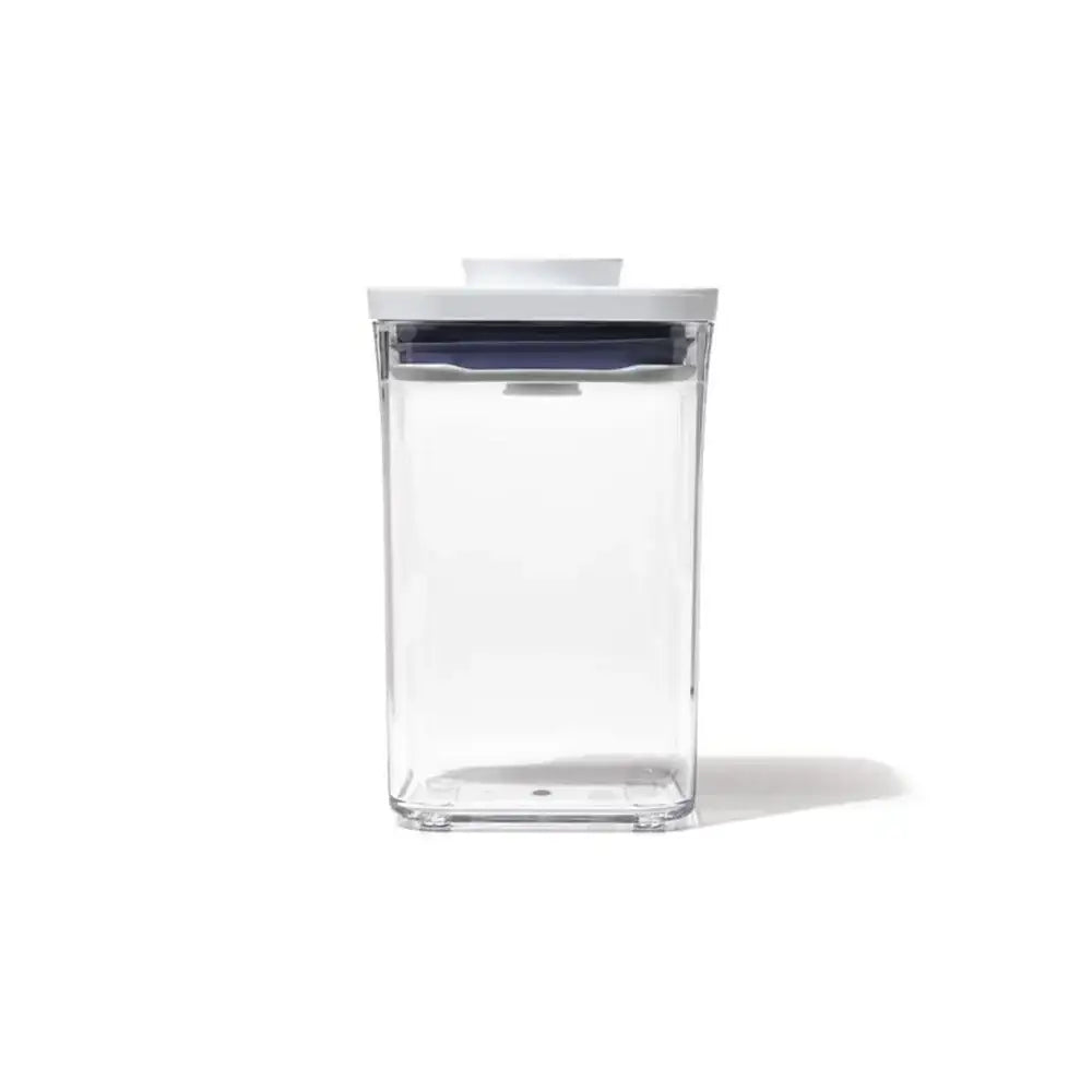 Clear storage container with a white lid on a white background
