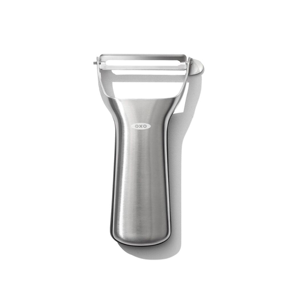 OXO stainless steel vegetable peeler on a white background