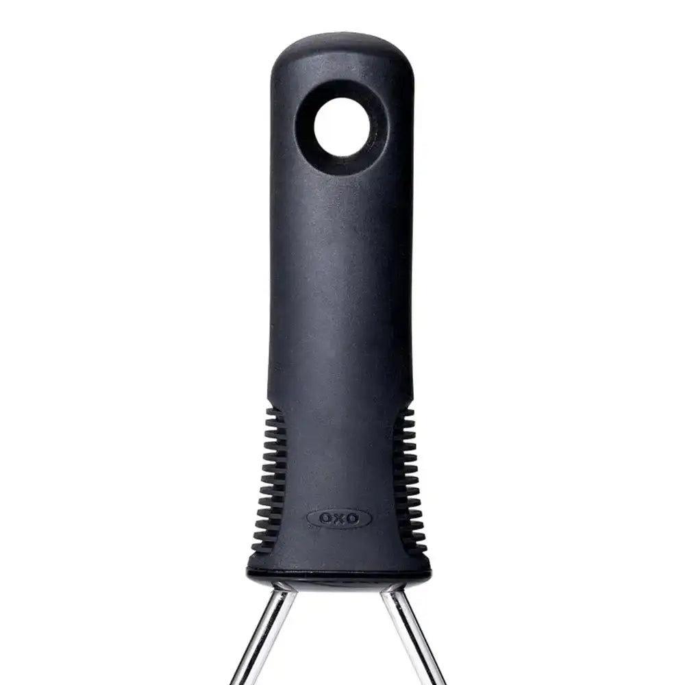 Black OXO utensil handle on a white background