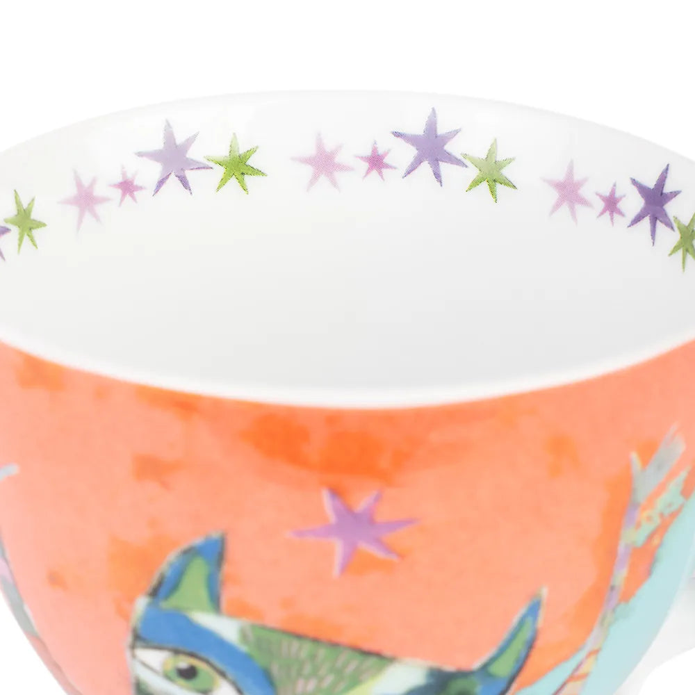Ceramic bowl with colorful star pattern on rim and abstract design inside