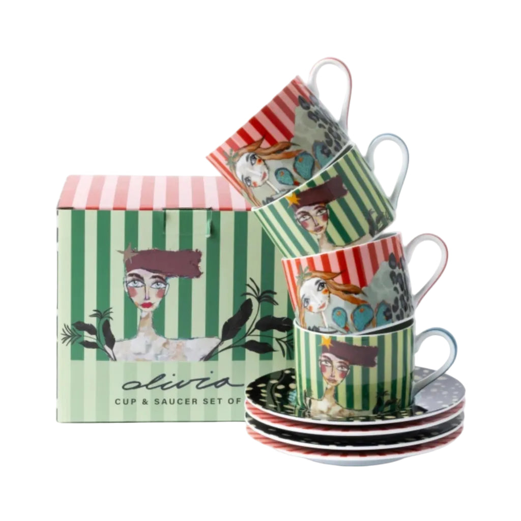 Set of cups and saucers with artistic designs on a white background