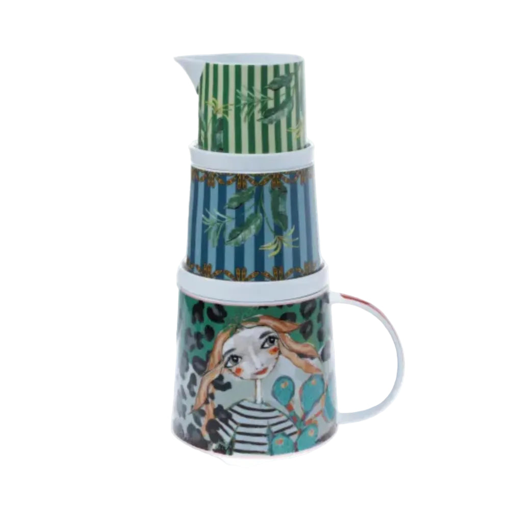 Set of ceramic teapot, mug, and pitcher with artistic designs on a white background