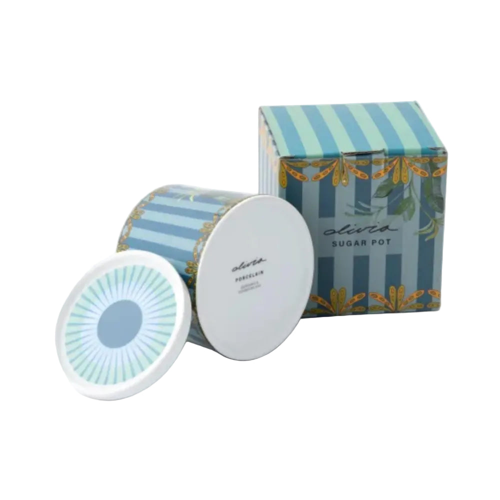 Decorative sugar pot with matching striped packaging on a white background