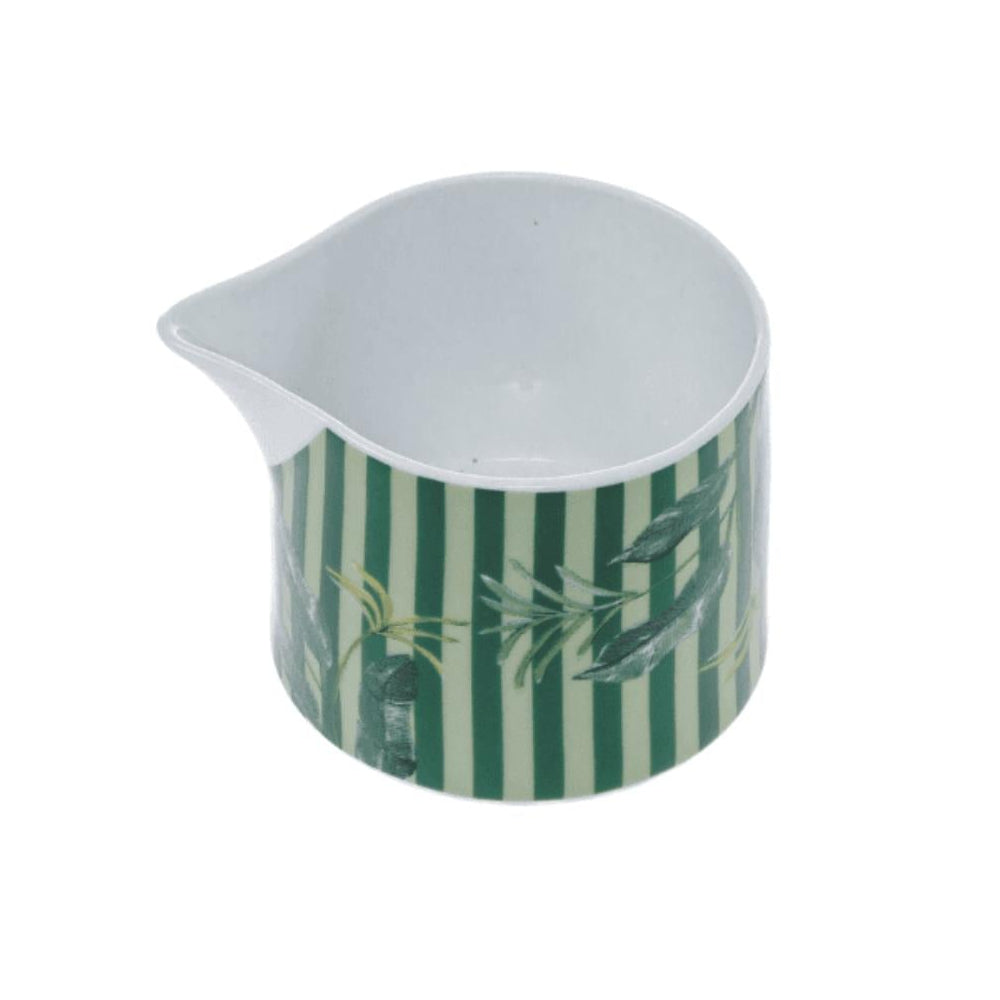 Green and white striped creamer with a white lid on a white background