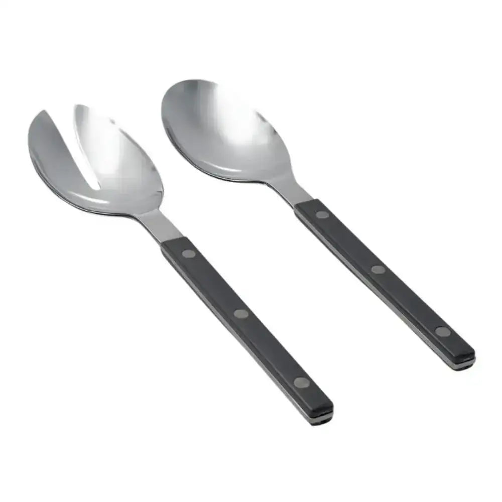 Two silver salad servers with black handles on a white background