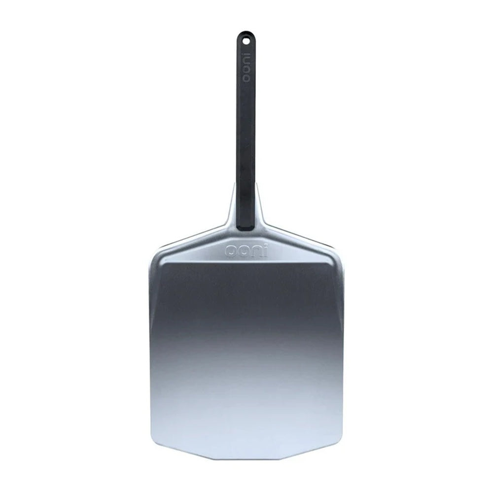 Metal pizza peel with a black handle on a white background