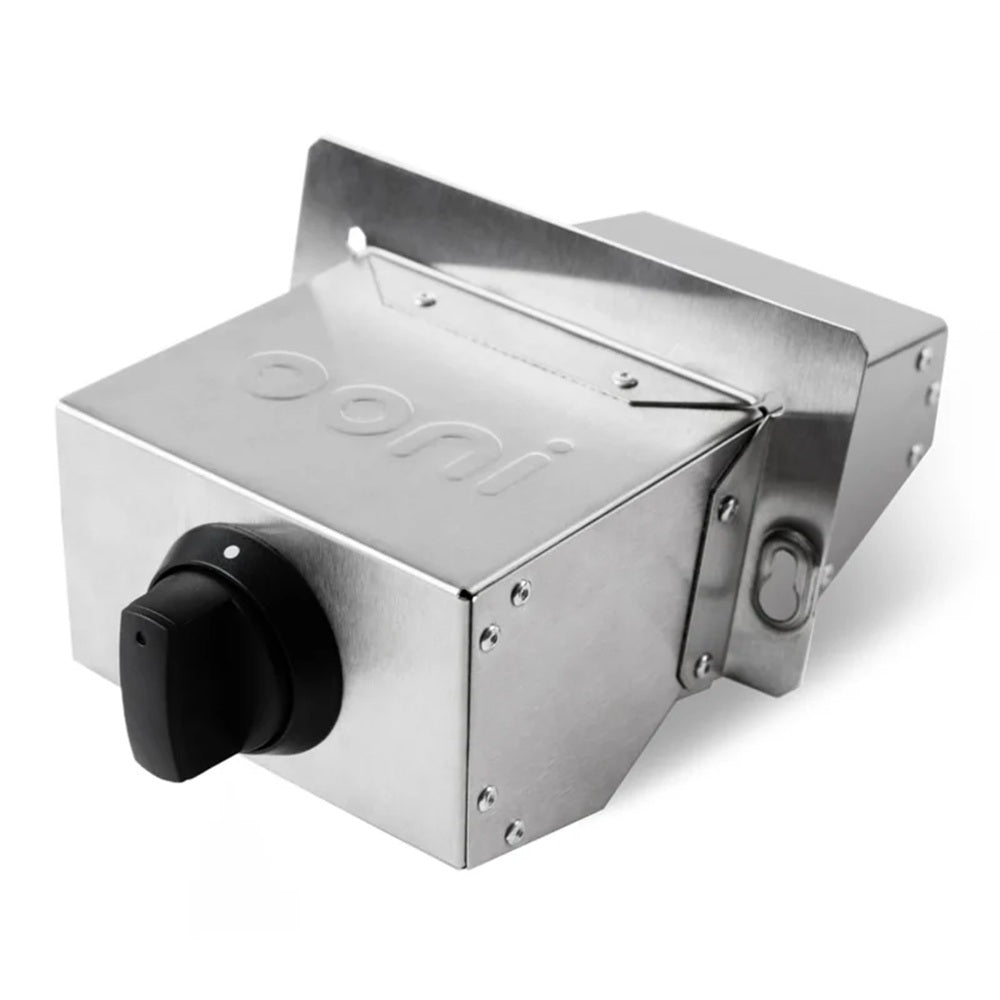 Metallic box with a black knob on a white background