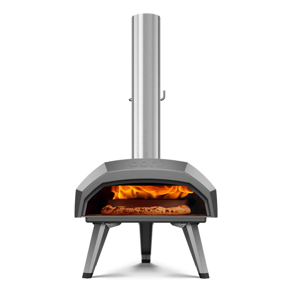 Outdoor pizza oven with fire inside on a white background