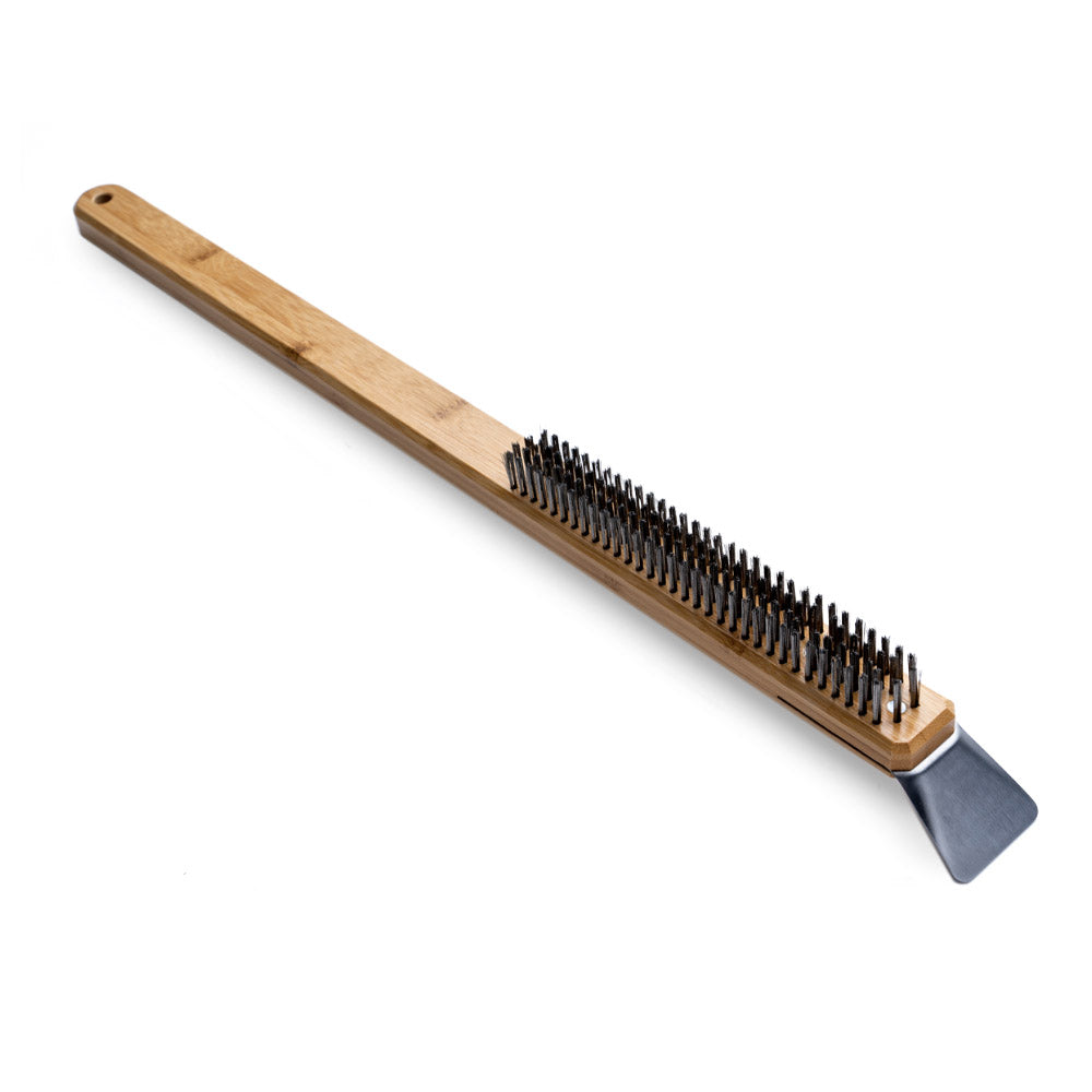 Wooden brush with metal bristles and a metal head on a white background