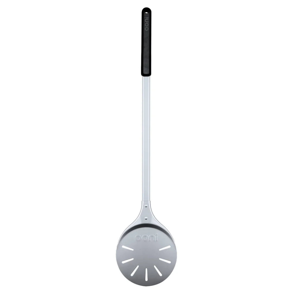 Metallic Ooni pizza peel with a white background 