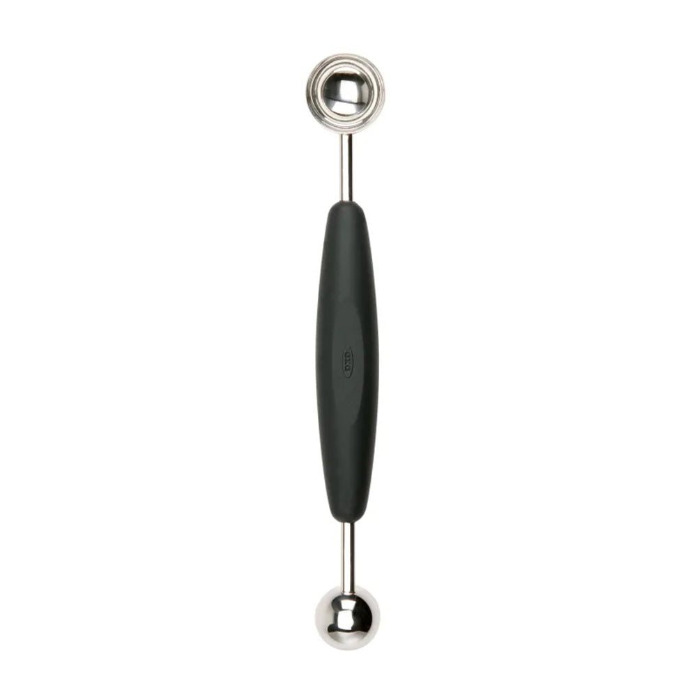 Two-toned kitchen tool with black handle and silver ends on a white background