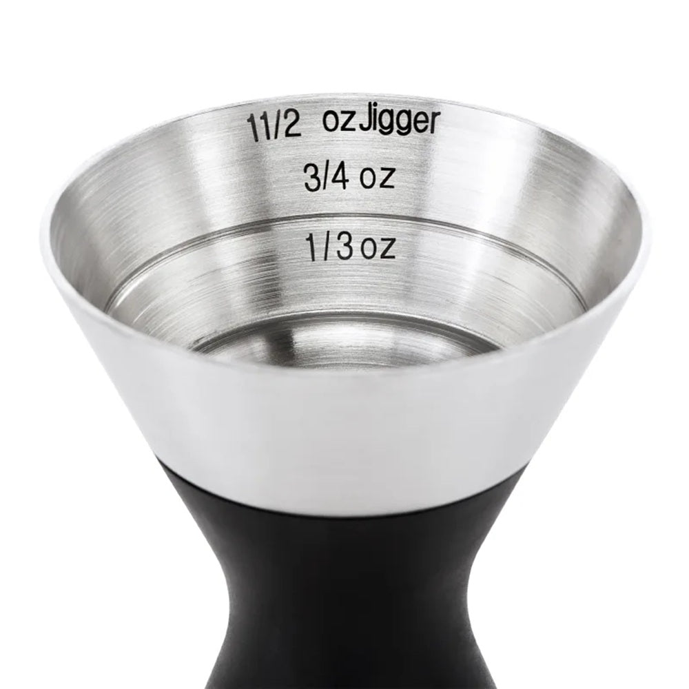 Metal jigger with measurements on a white background