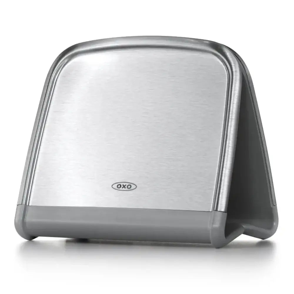 Silver OXO napkin holder on a white background