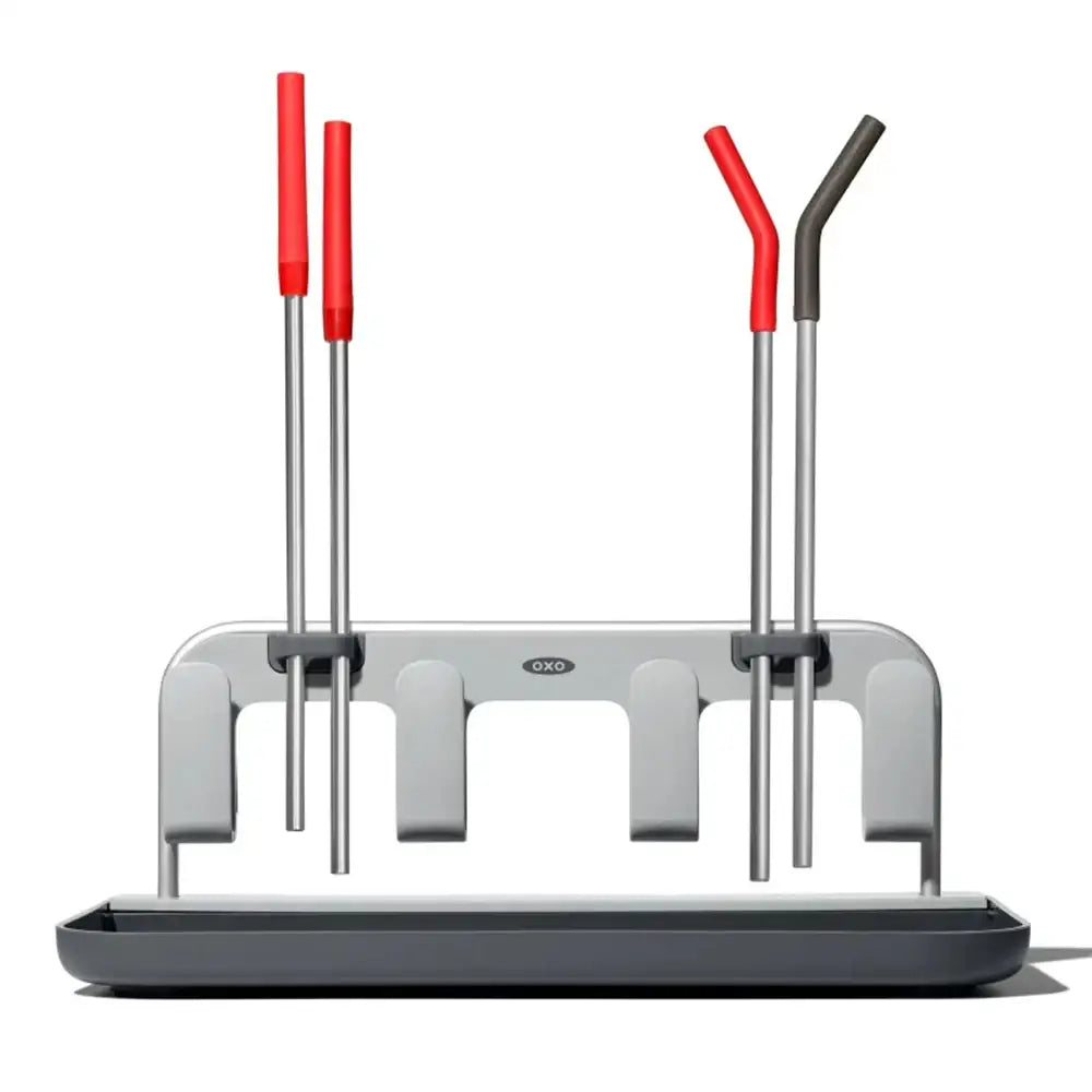 Drying rack with straws on a white background.