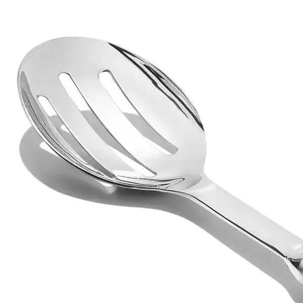 Oxo stainless steel slotted serving spoon in shiny metal with three parallel slots for draining liquids