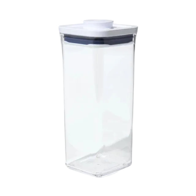 Clear storage container with a white lid on a white background
