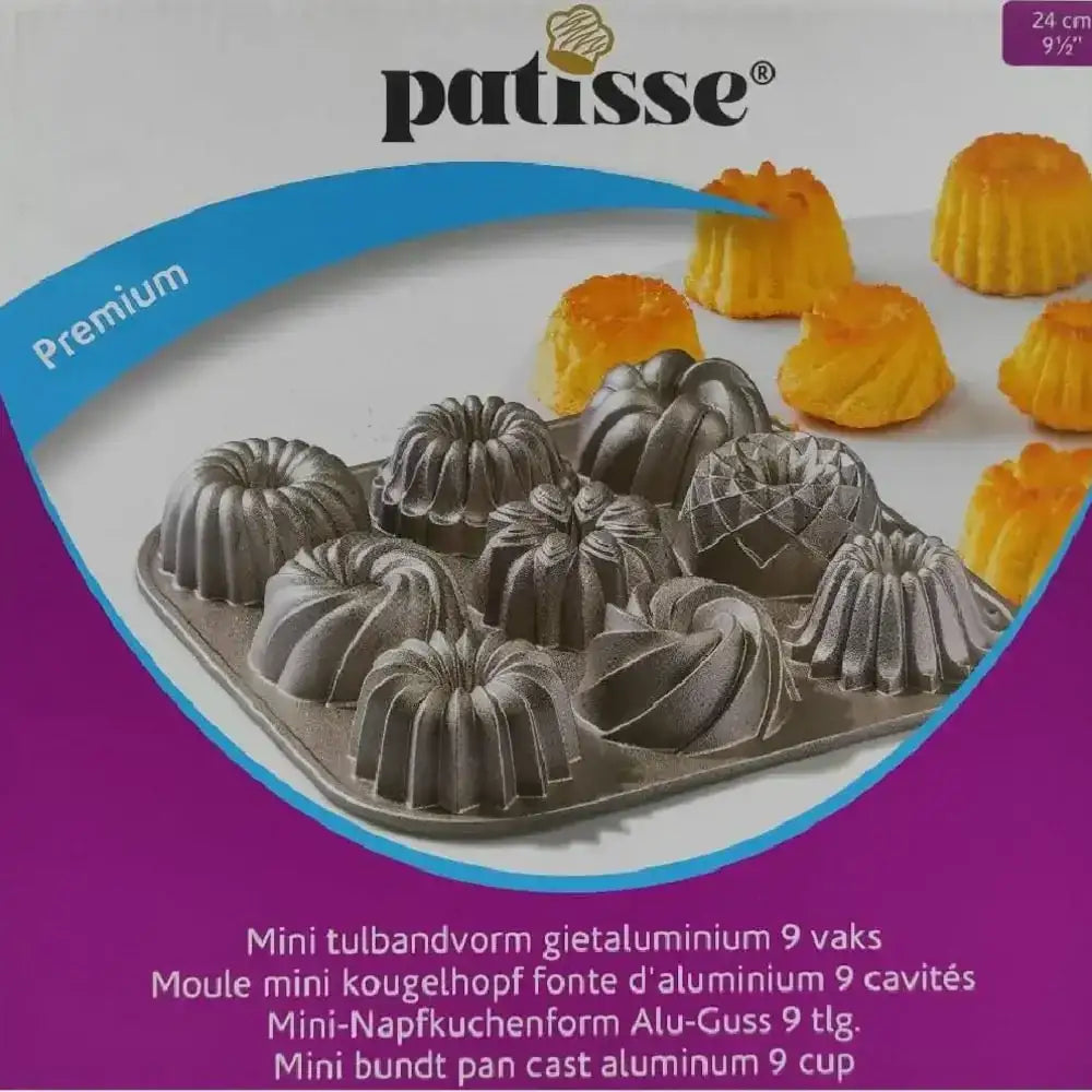 Patisse mini bundt cake pan on packaging with yellow cakes.