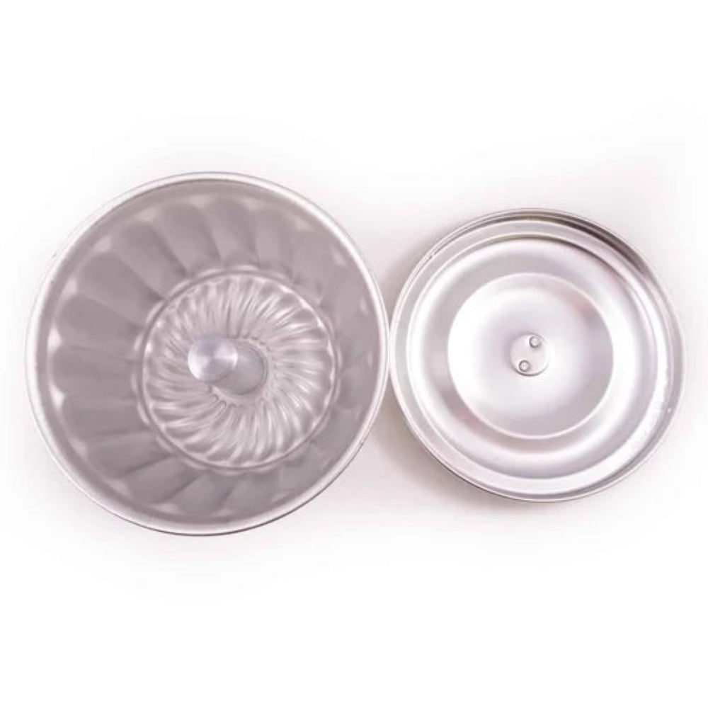 Pudding steamer mould and lid on a white background