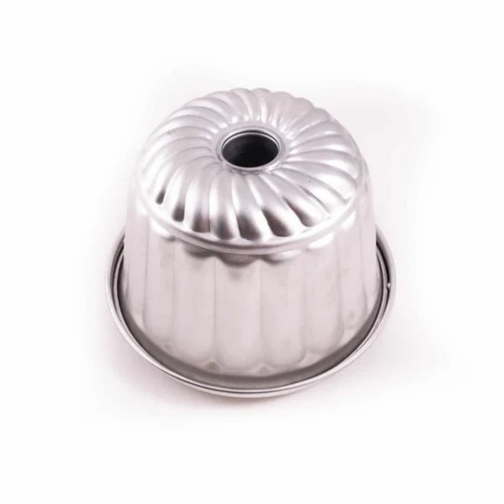 Pudding steamer mould on a white background