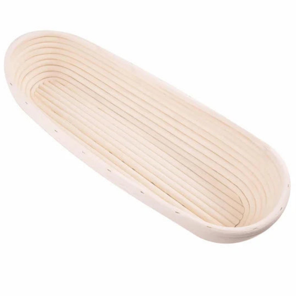 An oval banneton bread basket made of light natural wood, featuring a ribbed interior and pre-drilled edge holes, shown on a solid white background.
