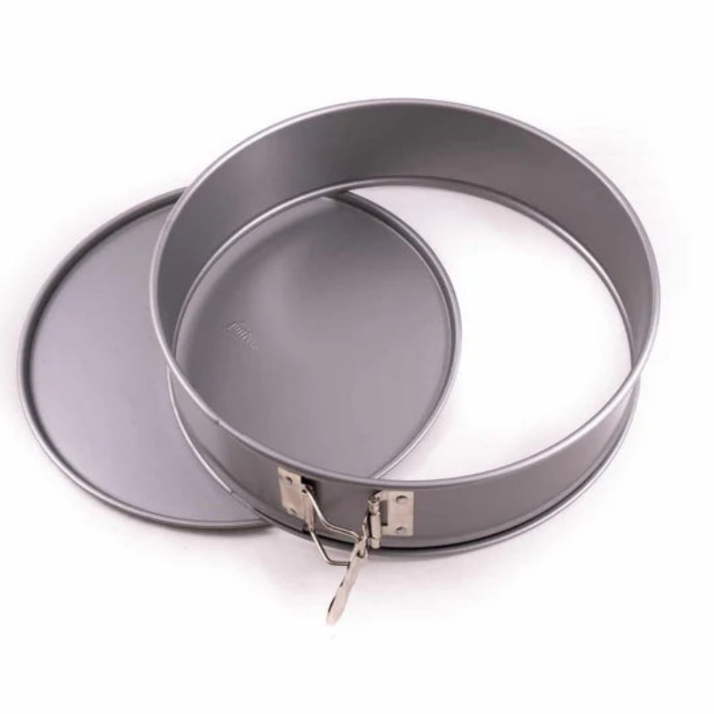 Two metal cake pans on a white background