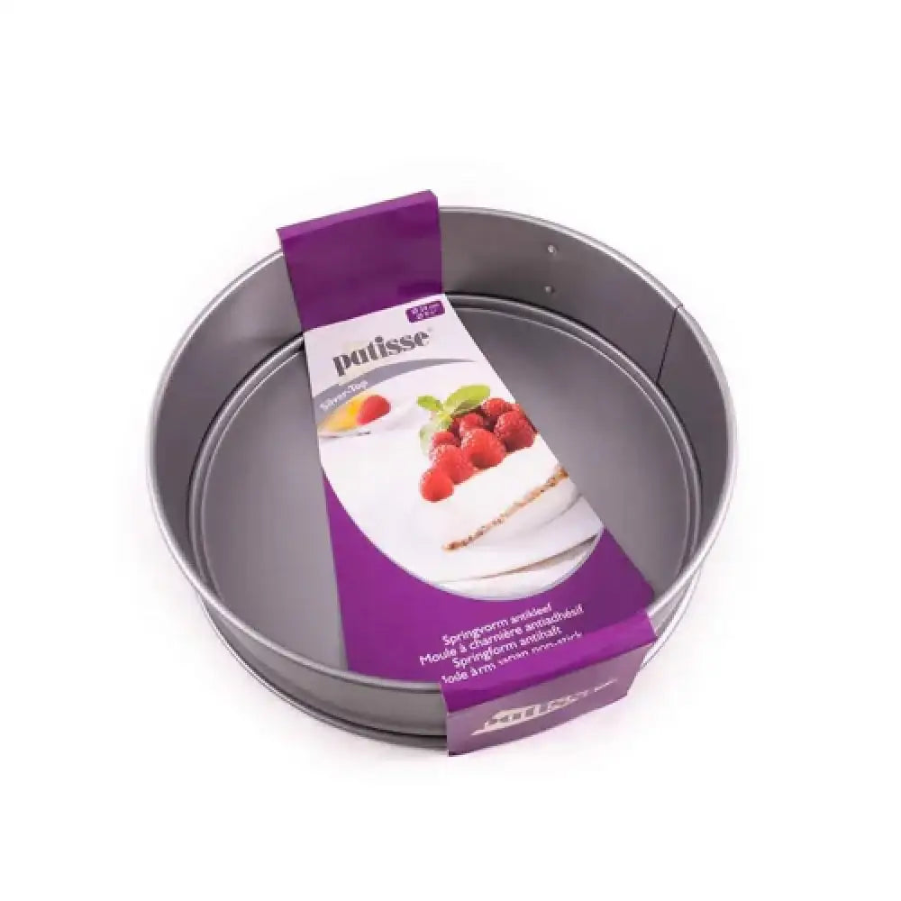 Metal cake pan with a purple packaging label featuring a cake illustration on a white background