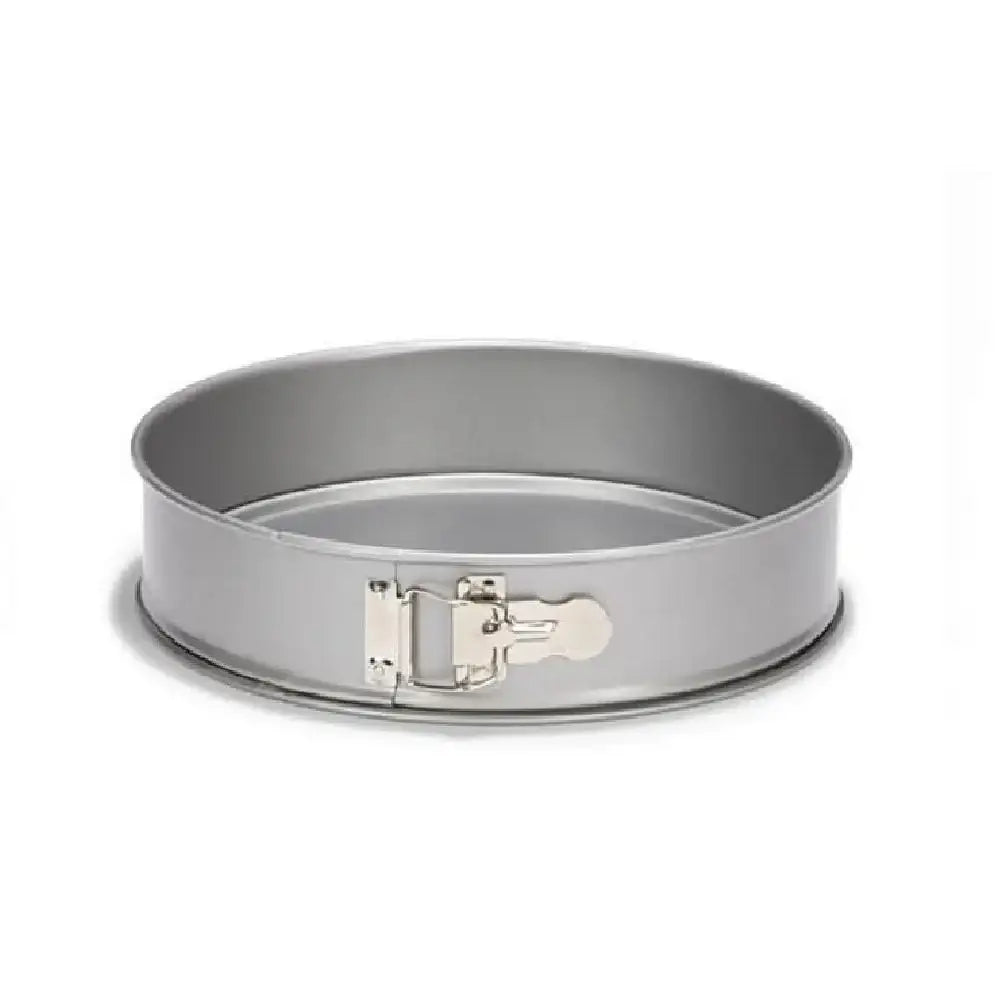 Metal springform pan on a white background