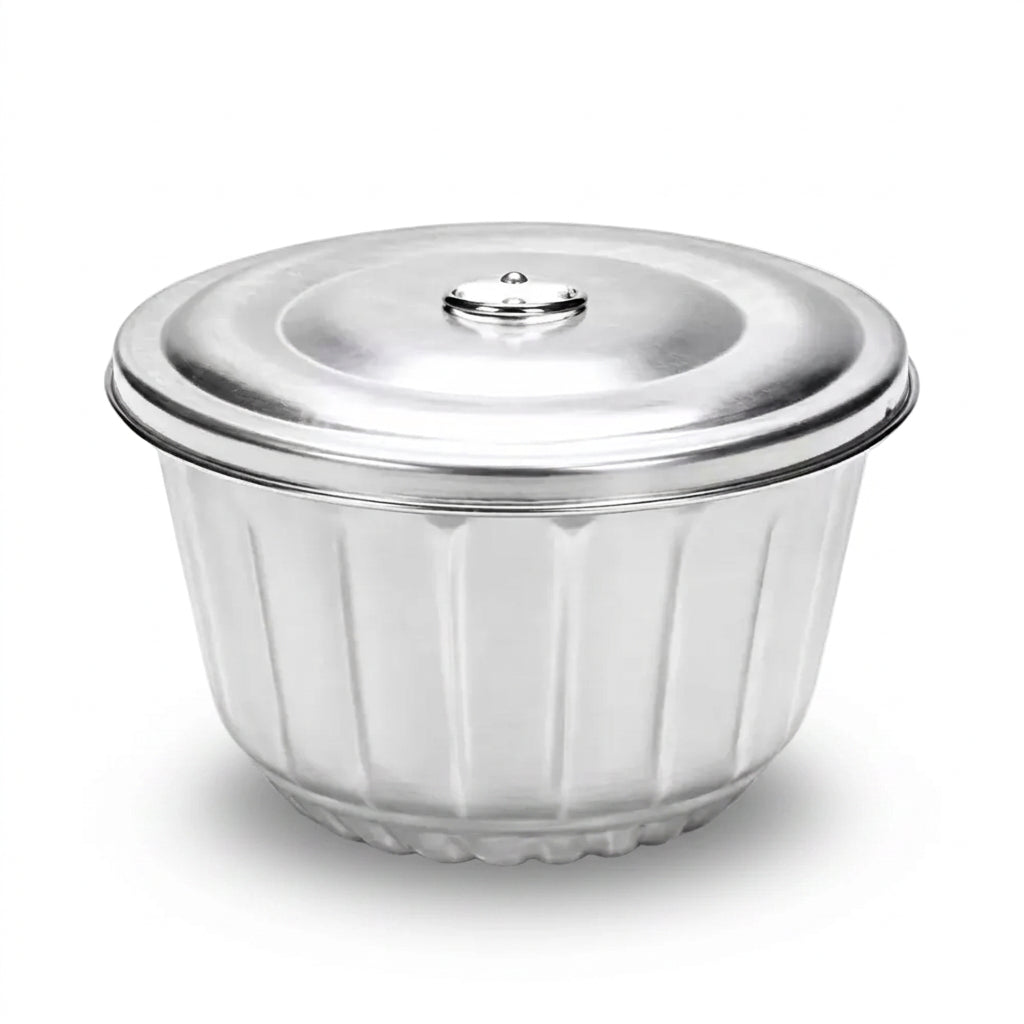 Pudding steamer mould on a white background