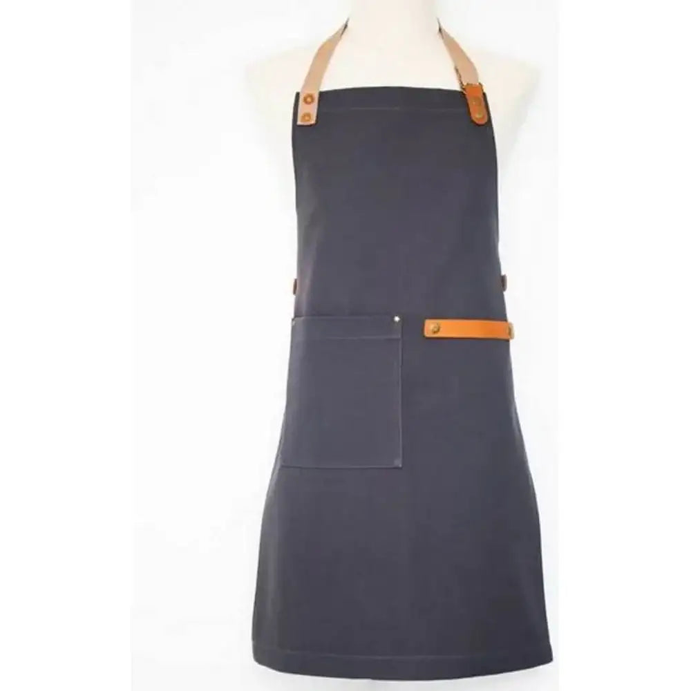 Dark blue apron with brown leather straps on a white background