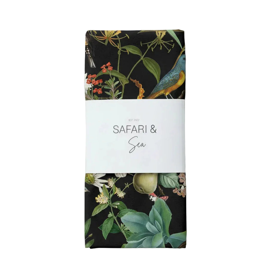Packaging with 'Safari & Sea' branding and floral design on a white background