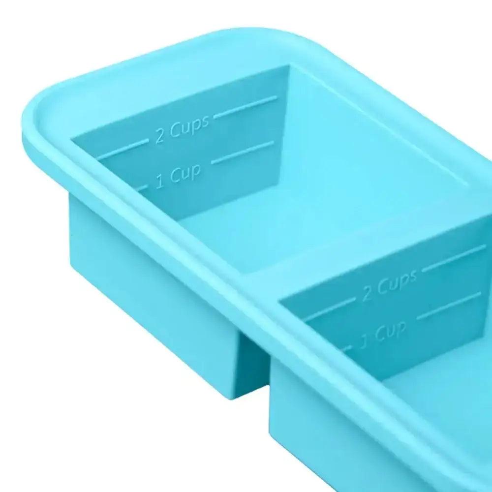 Blue silicone measuring container with cup markings on a white background
