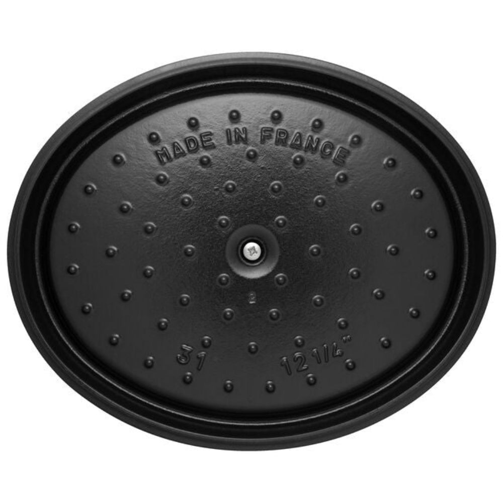 Black metal lid with 'Made in France' text on a white background
