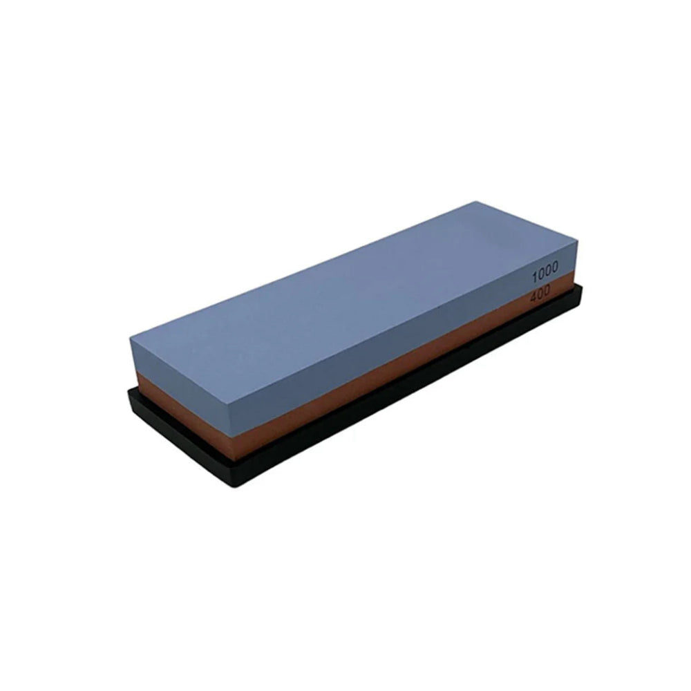 Double-sided sharpening stone with blue and brown grit on a white background