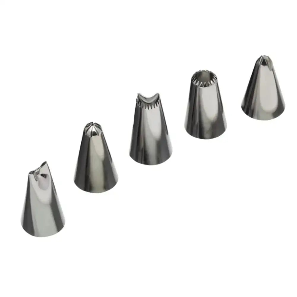 Set of five metal piping tips on a white background