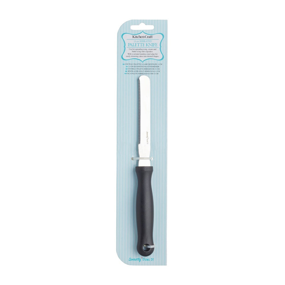Palette knife with black handle in packaging on a white background