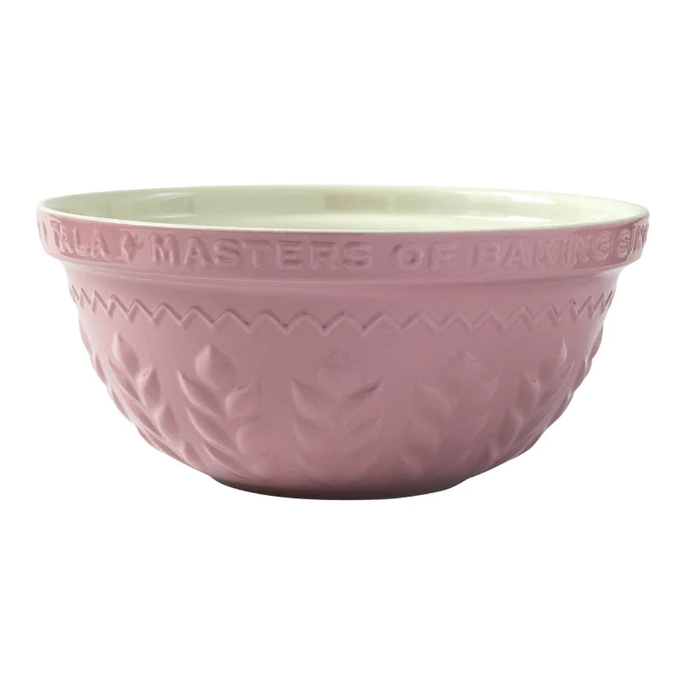 Pink mixing bowl with white interior on a white background
