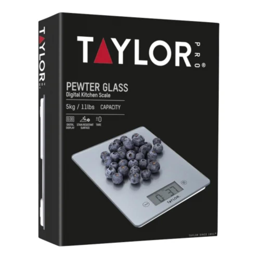 Taylor digital kitchen scale packaging with blueberries on a white background