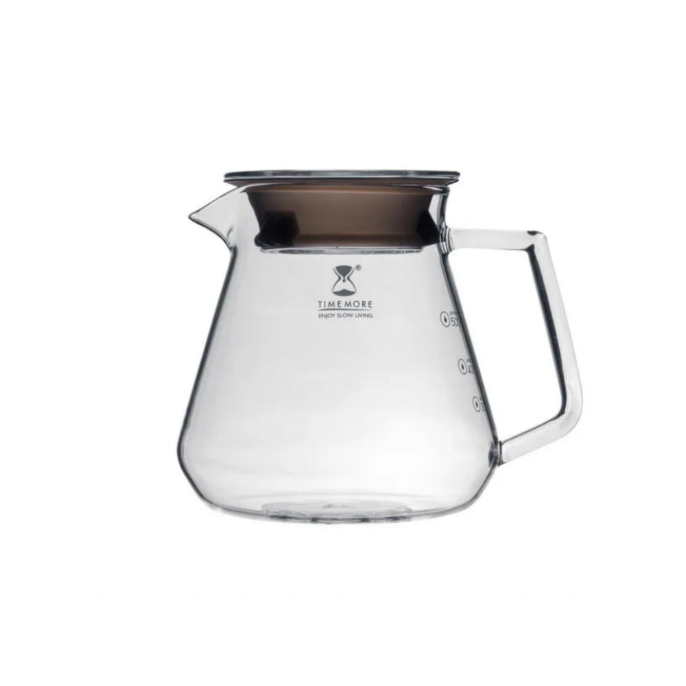 Clear glass coffee server with wooden lid on a white background
