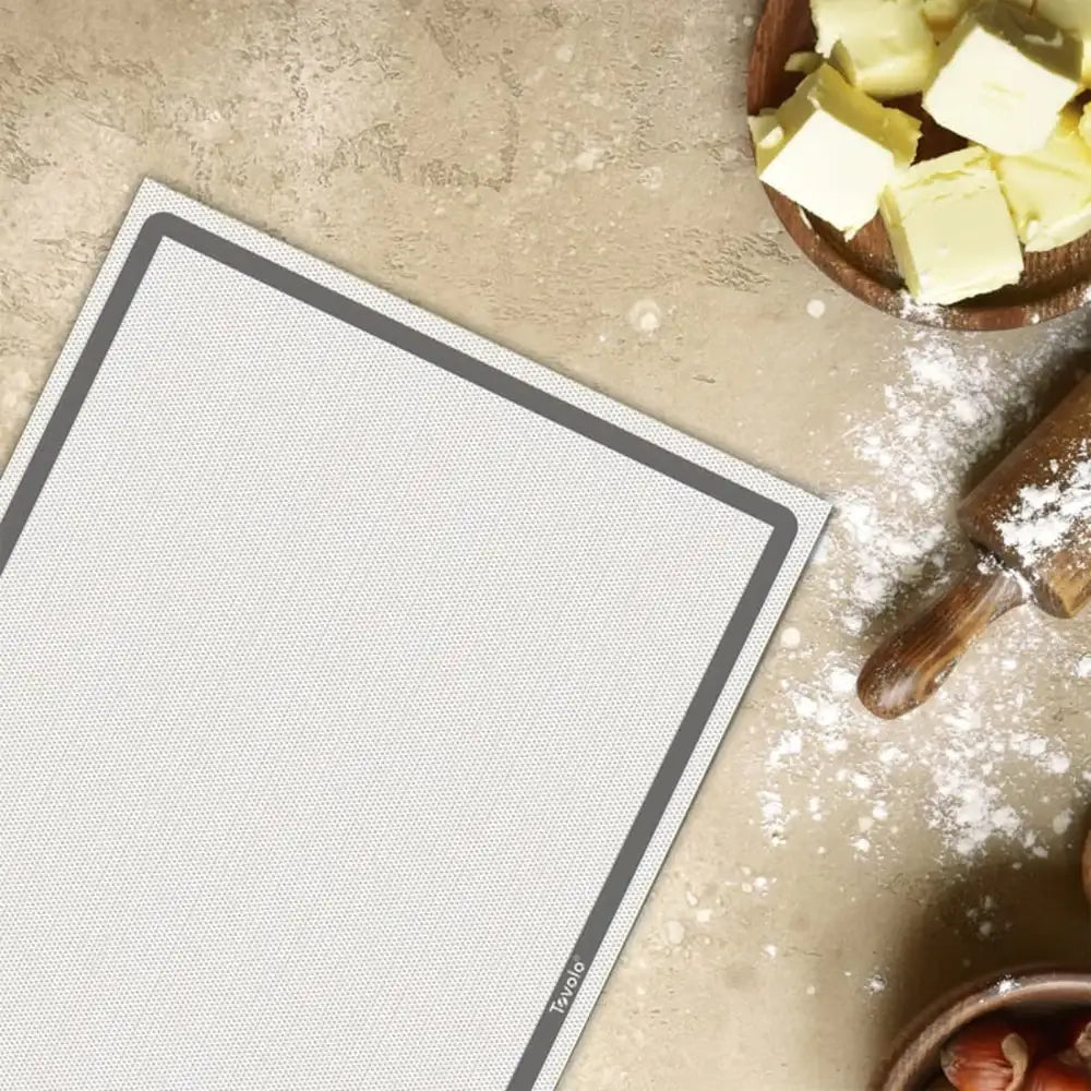 Silicone baking mat on a countertop with ingredients