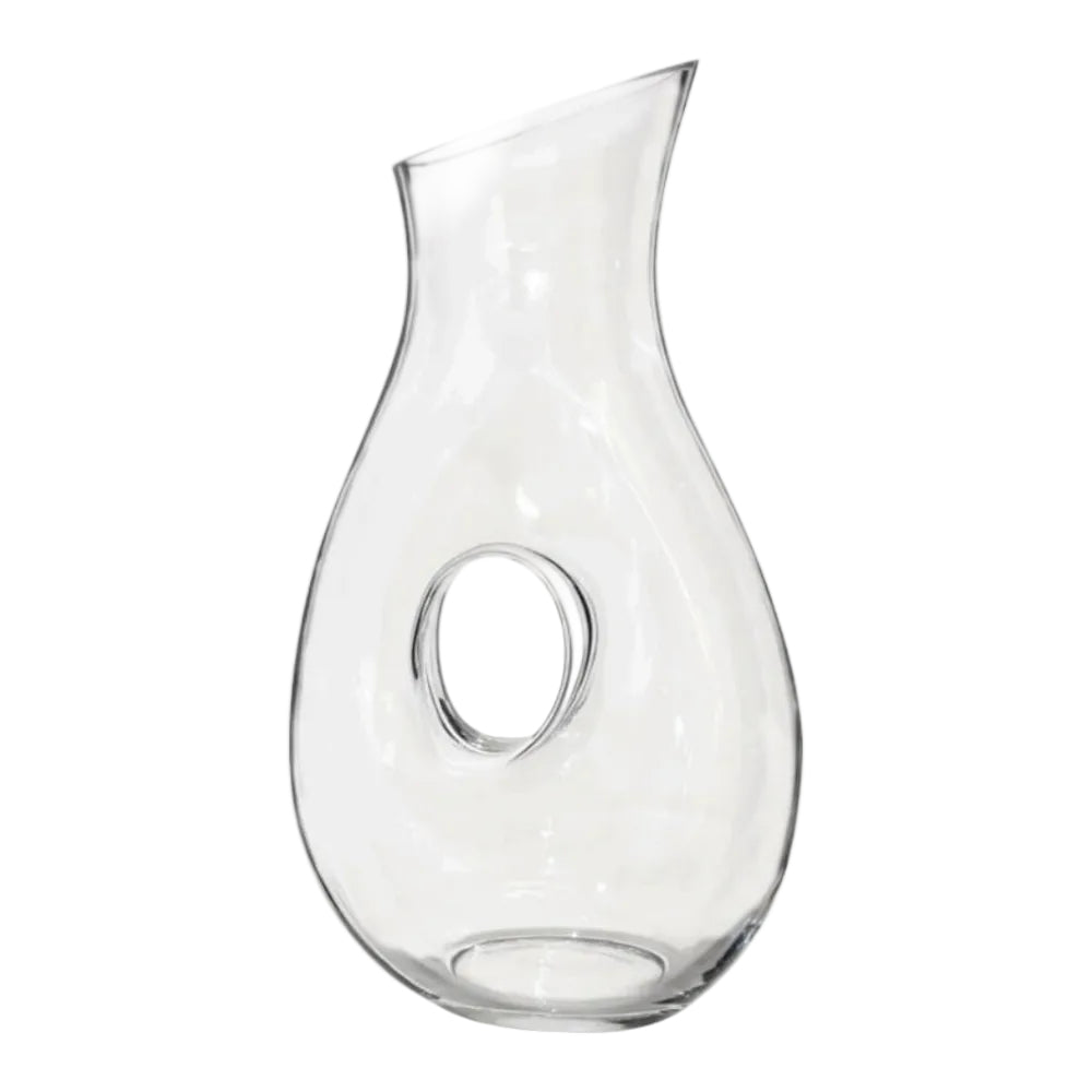 Clear glass carafe on a white background