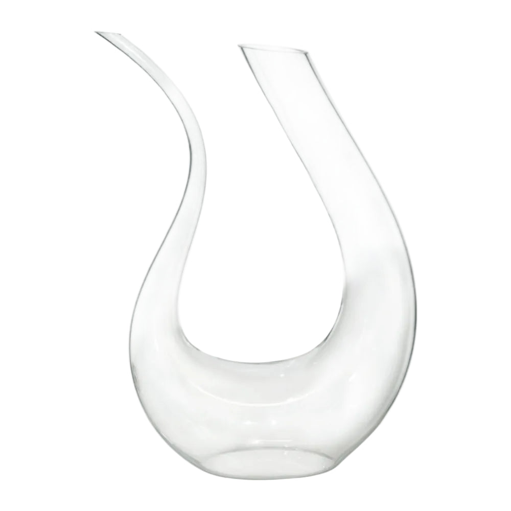 Clear glass wine decanter on a white background