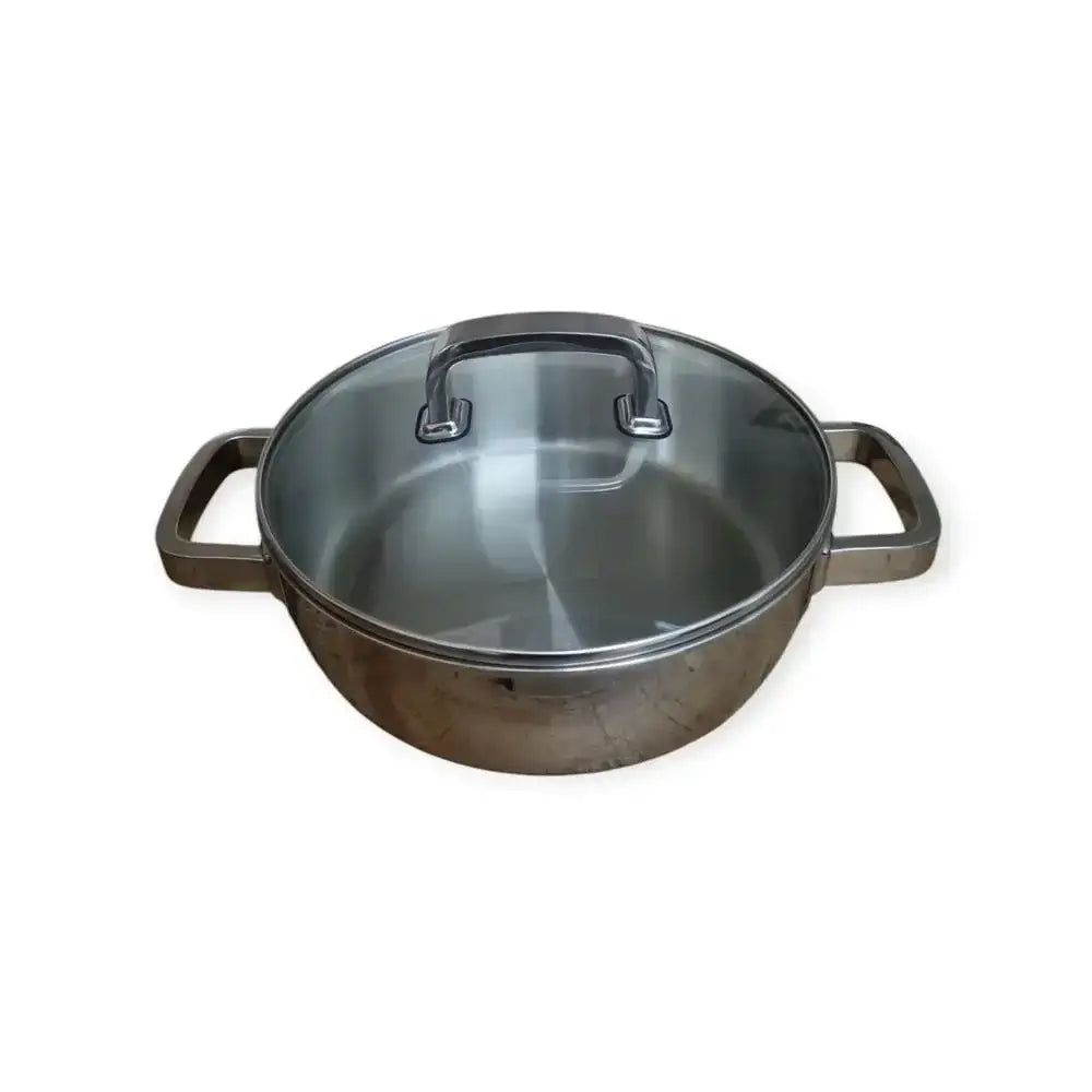 Stainless steel pot with lid on a white background