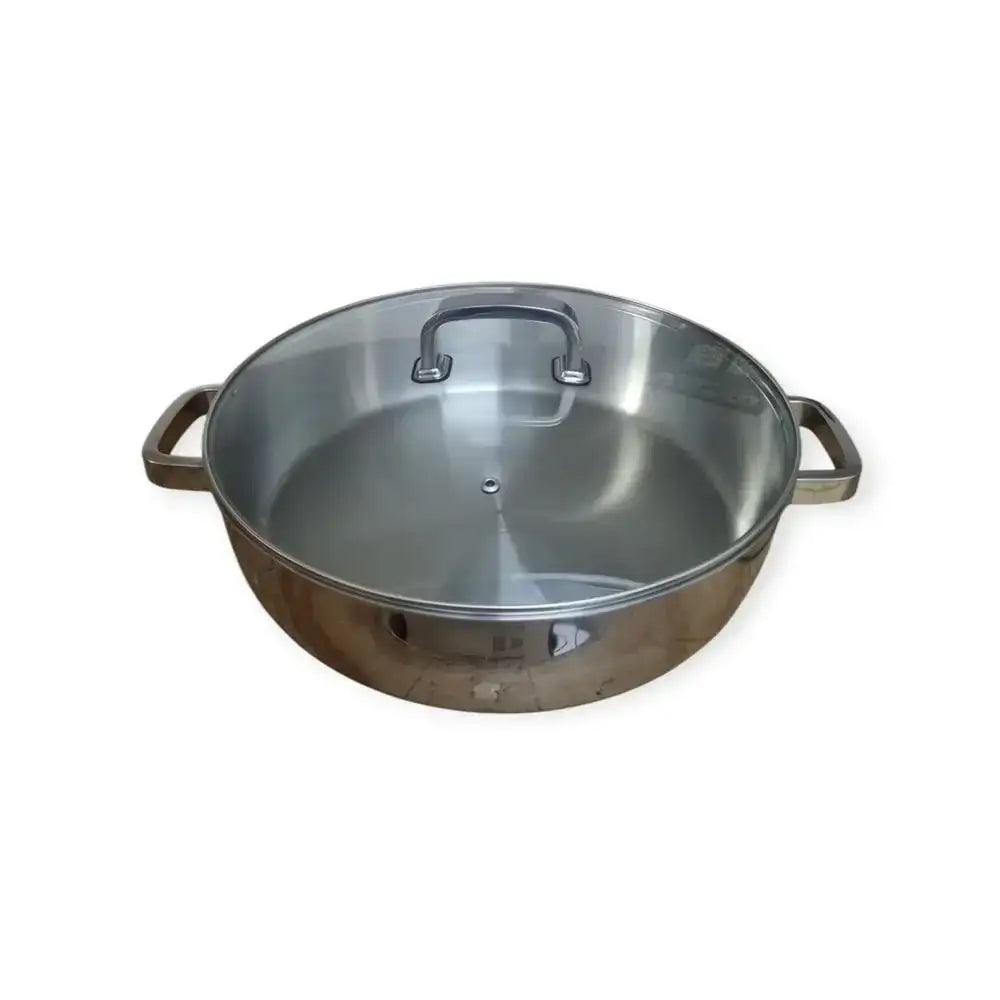 Stainless steel pot with lid on a white background