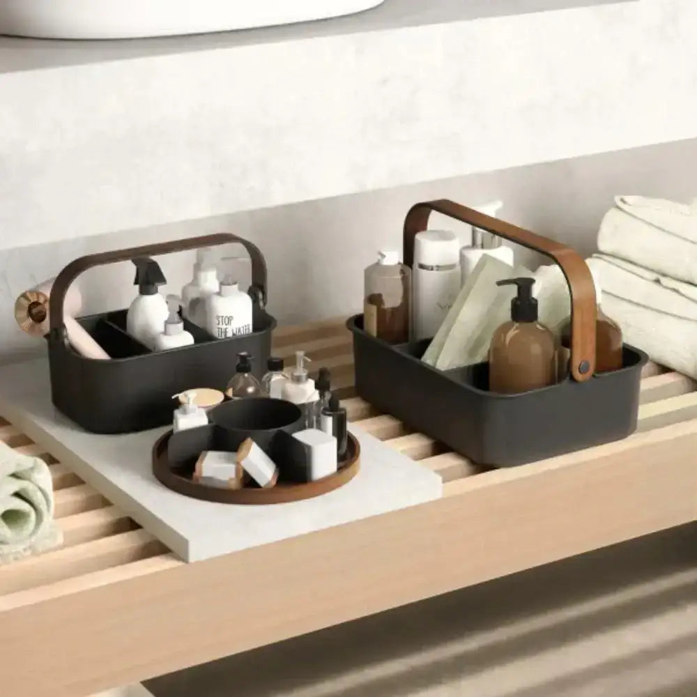 Bathroom shelves with storage baskets and toiletries on a wooden vanity.