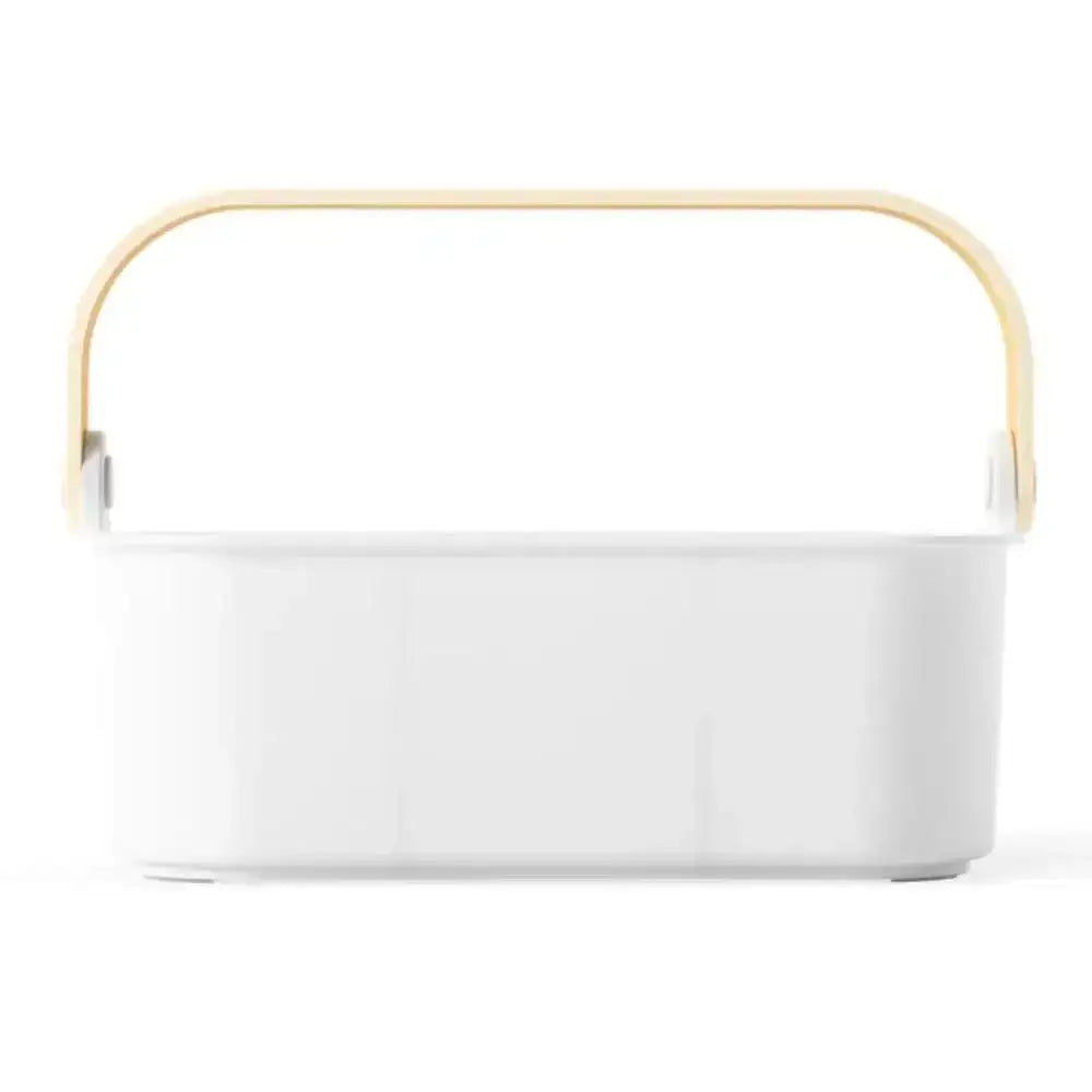 White rectangular basket with a yellow handle on a white background