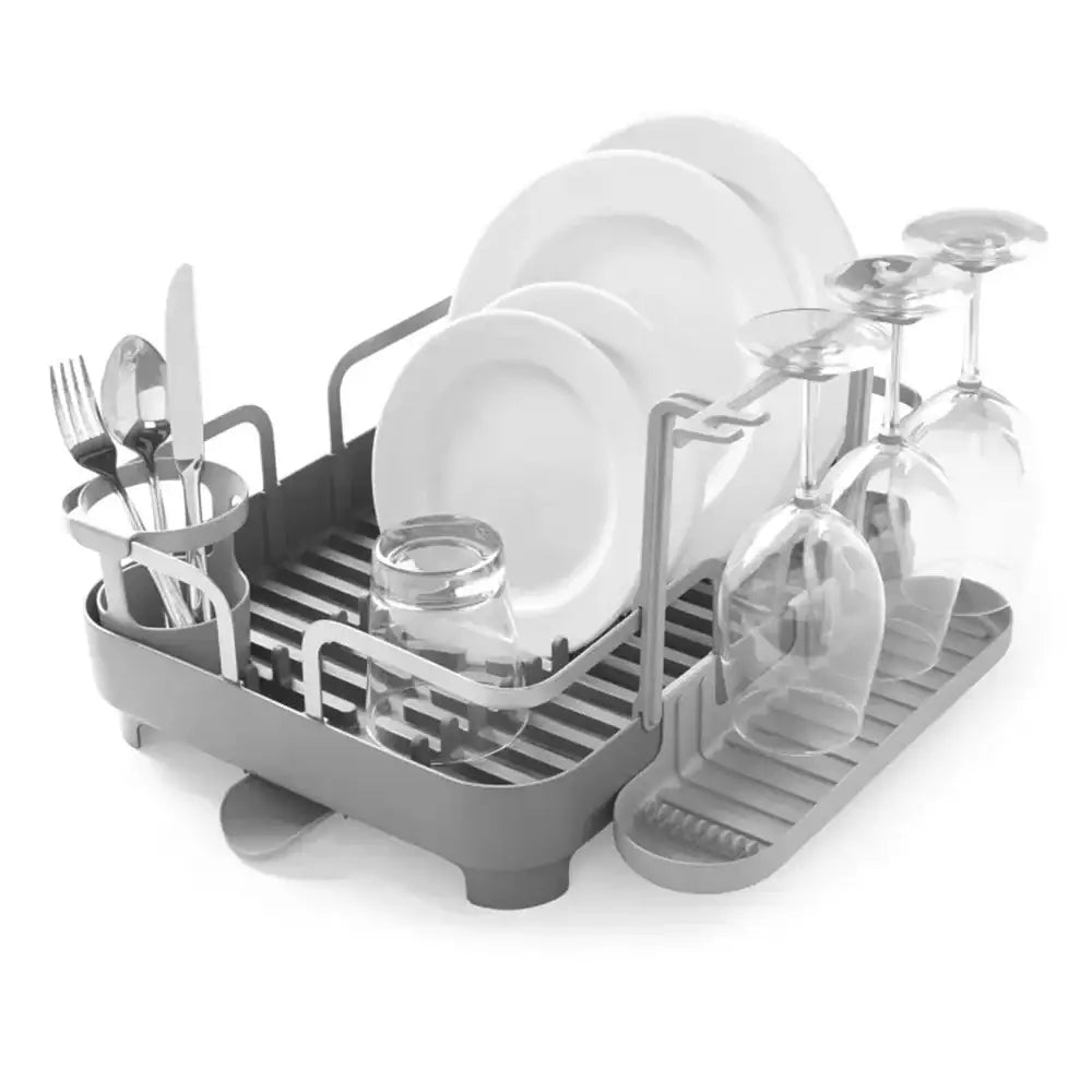 Gray dish rack with plates, glasses, and cutlery on a white background