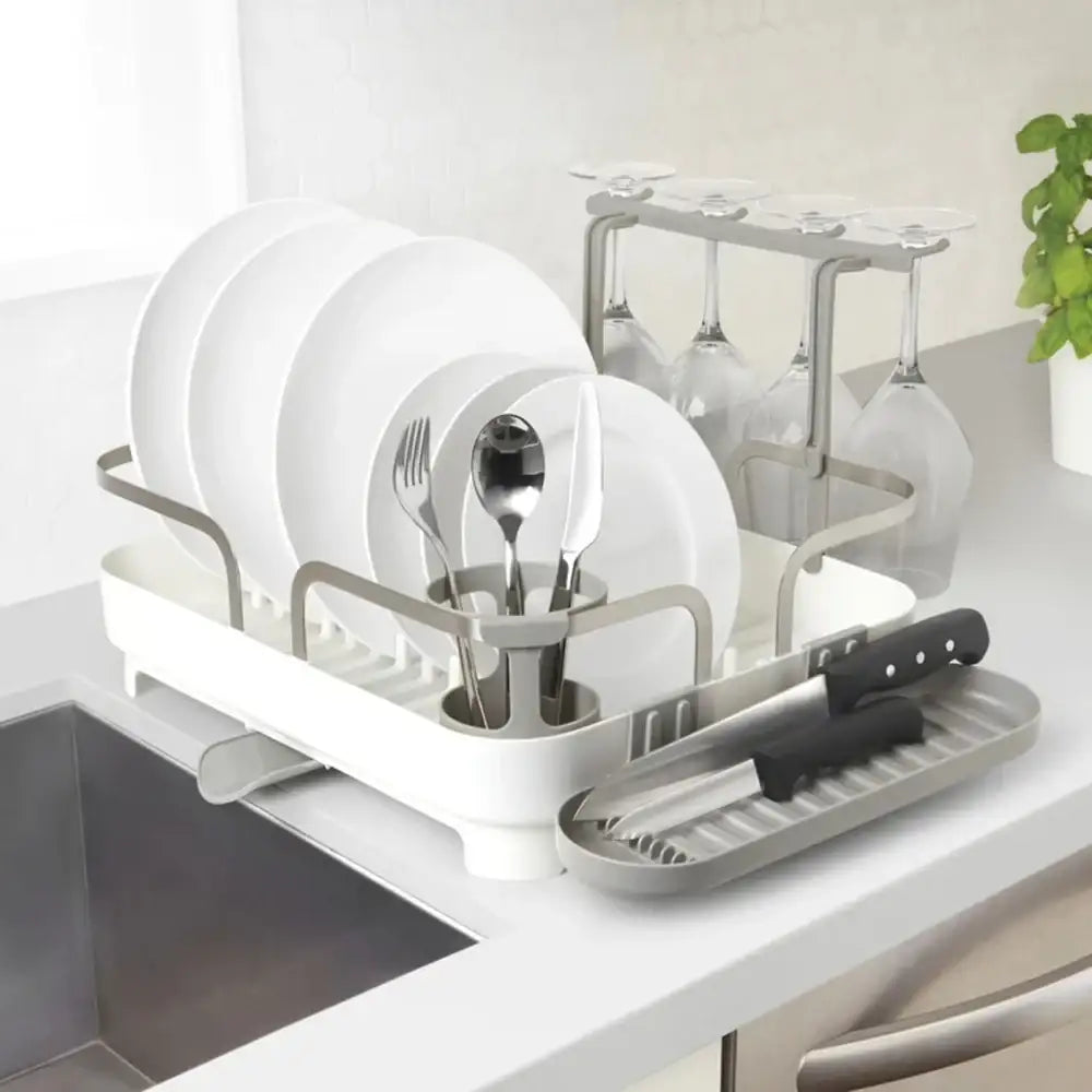 Dish rack with dishes on a kitchen counter