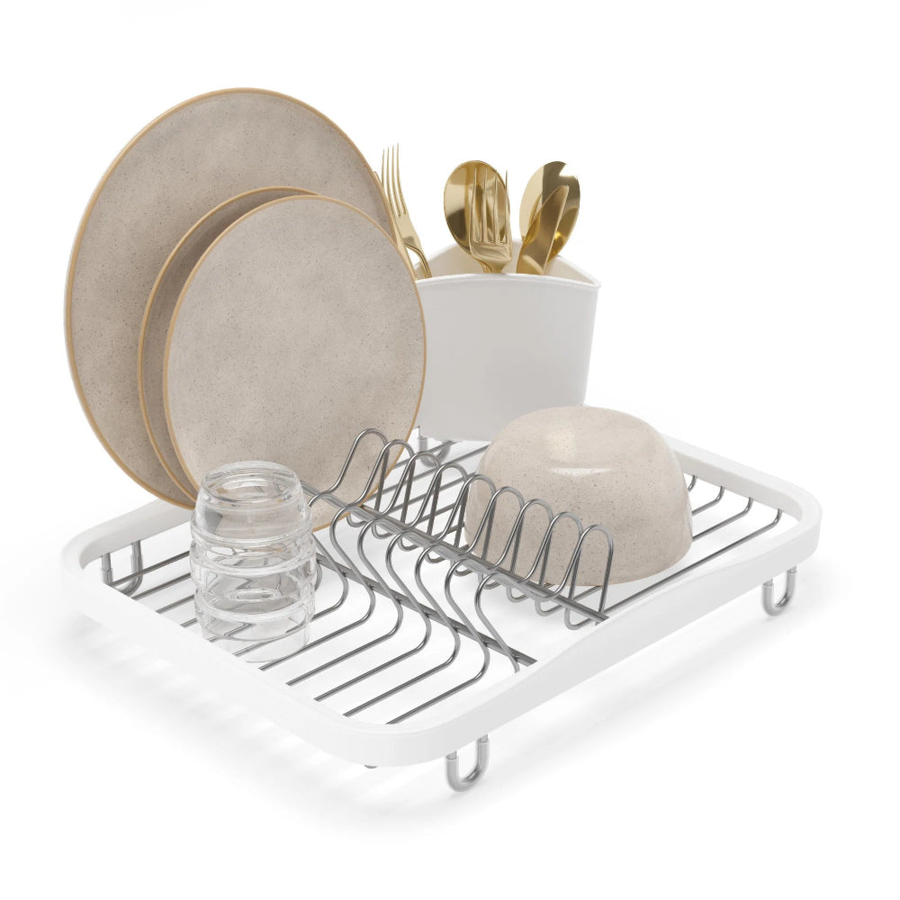 Dish rack with plates, cups, and utensils on a white background