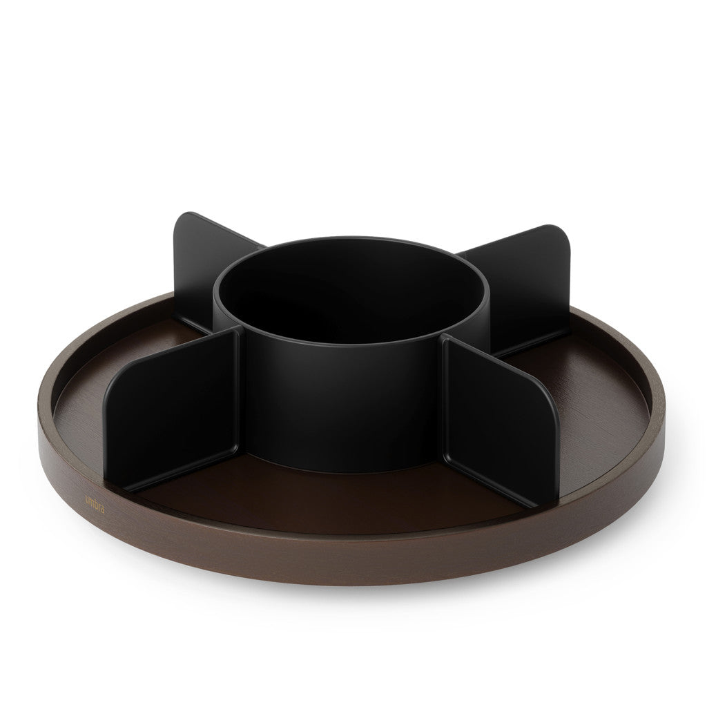 A modern lazy susan with a dark brown base and a black central cup and four petal-like side dividers, shown on a clean white background.